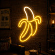Banana Man Cave Neon Sign glowing on a game room wall above a snack counter