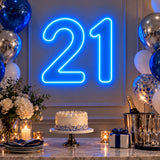 Blue 21st birthday number neon sign on a party table