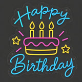 Colorful birthday cake neon sign lit on a dark gray background