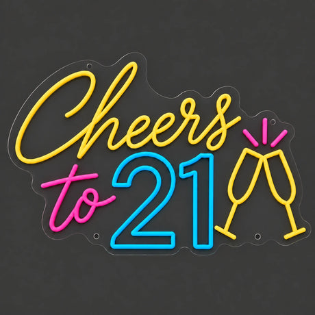 Colorful Cheers to 21 neon sign lit on a dark gray background