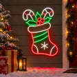 Christmas stocking neon sign with candy canes and holly