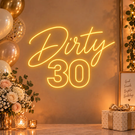 Gold Dirty 30 neon sign on a birthday party wall