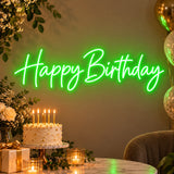 Green Happy Birthday neon sign at a cake party