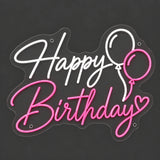 Pink and white Happy Birthday balloon neon sign lit on a dark gray background