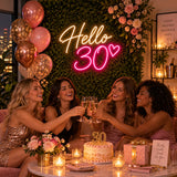 Pink Hello 30 neon sign at a 30th birthday party