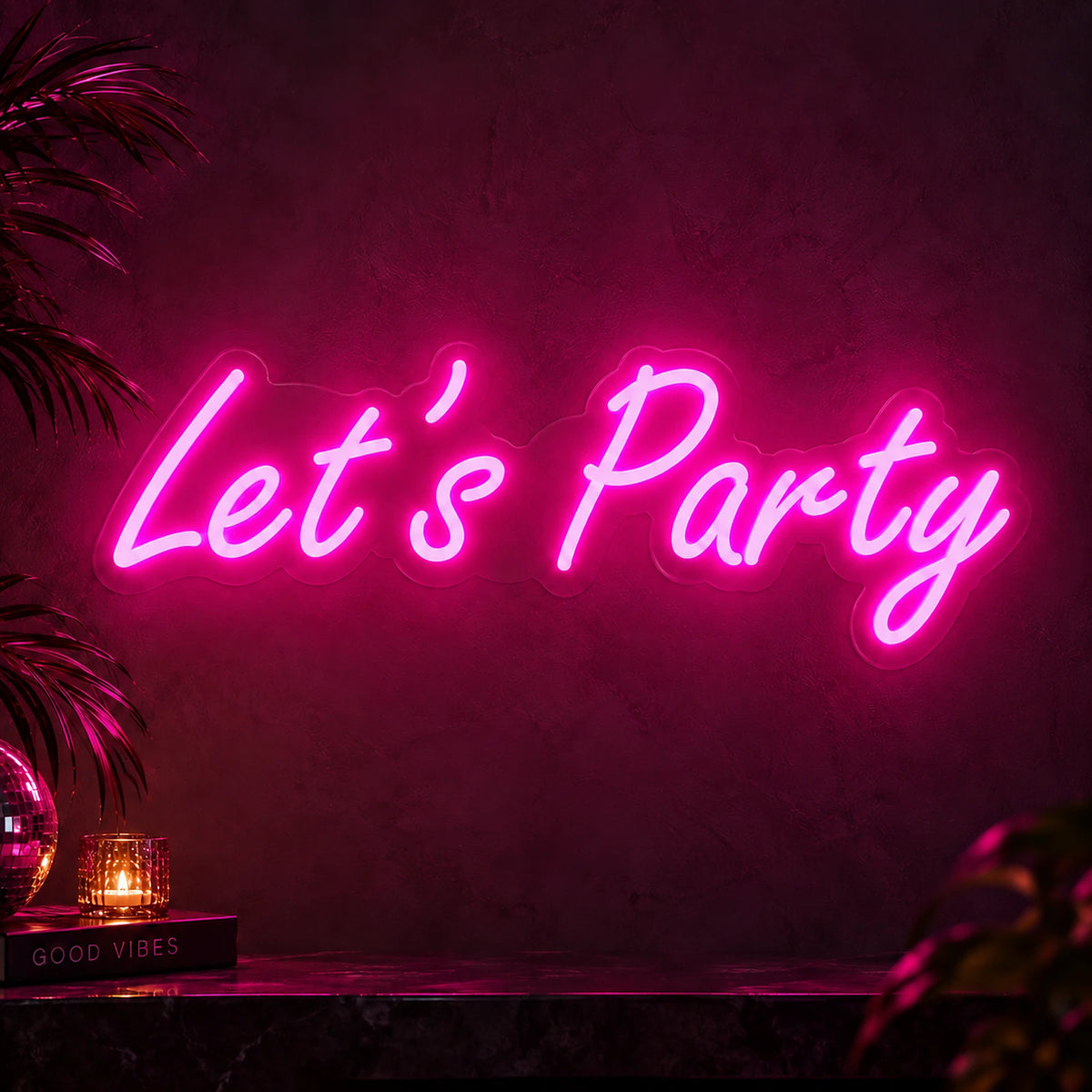 Pink Let’s Party neon sign as event backdrop décor