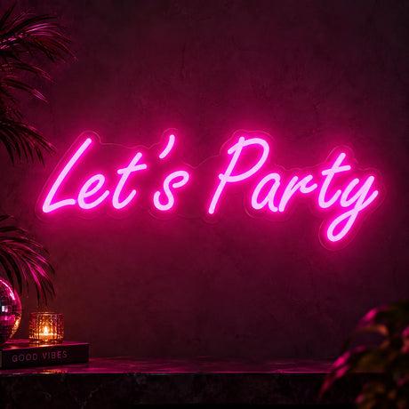 Pink Let’s Party neon sign as event backdrop décor