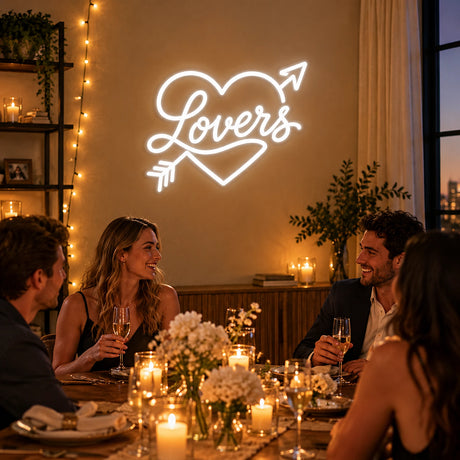 Lovers heart and arrow neon sign at a romantic dinner party