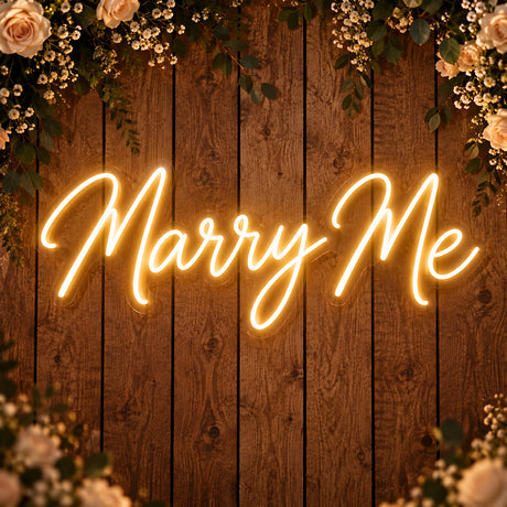Marry Me neon sign on a wooden wall for a wedding proposal