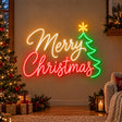 Merry Christmas neon sign with green Christmas tree