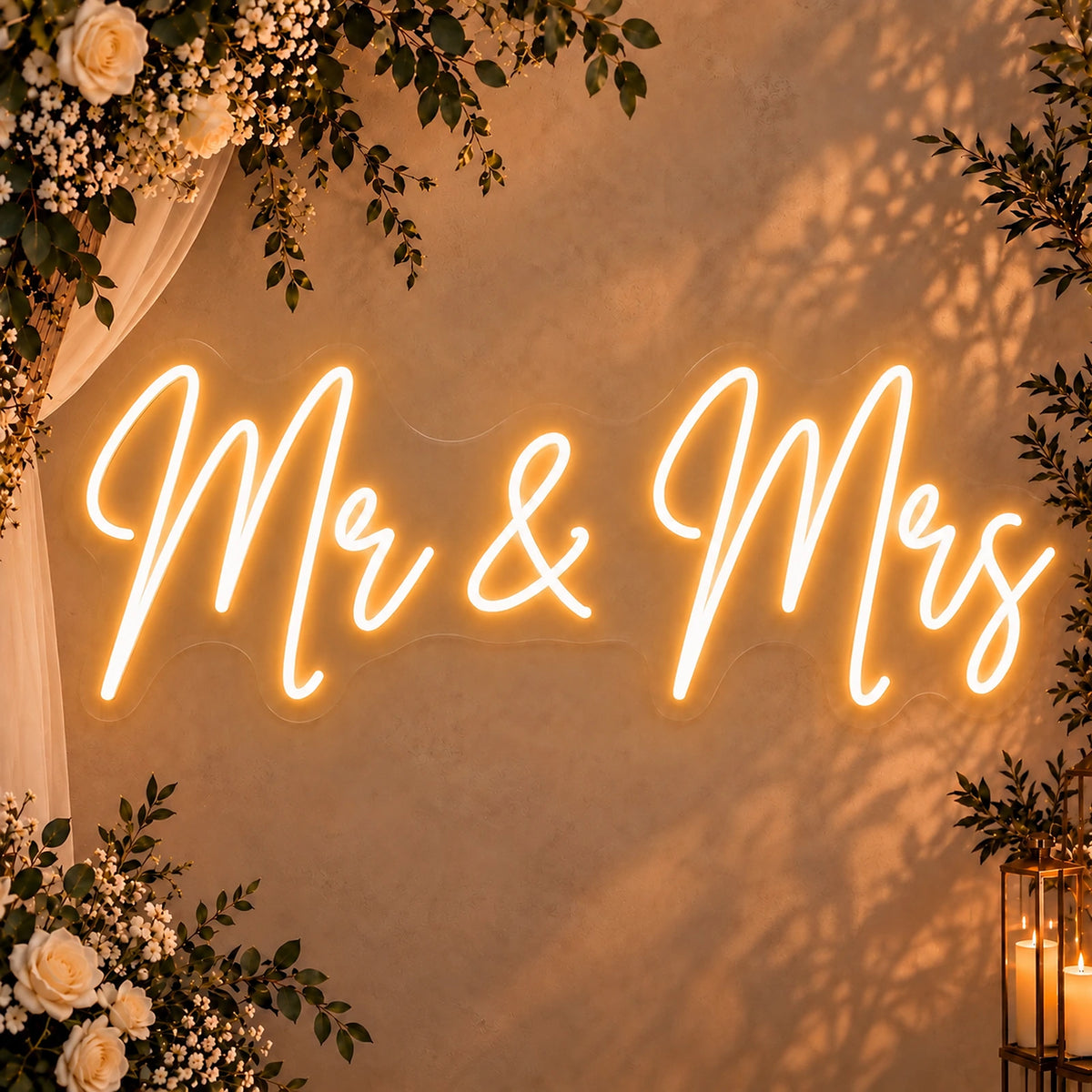 Mr & Mrs wedding neon sign in warm white on a wall