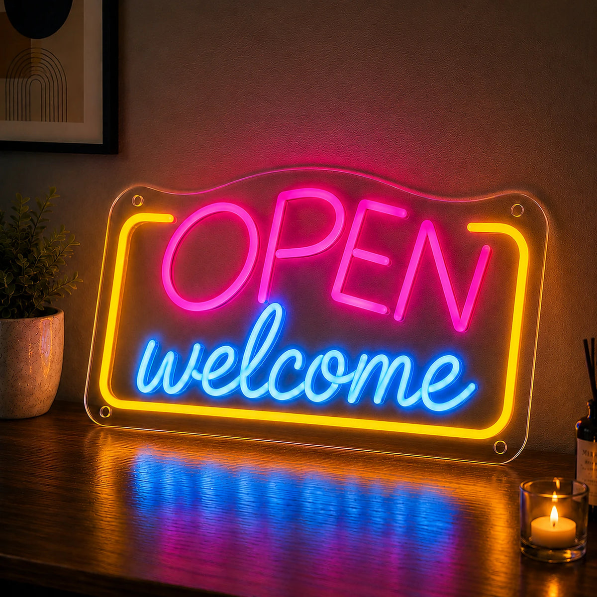 Open welcome neon sign shown lit at night on a business entrance