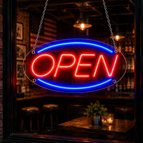 Retro neon open sign with red and blue oval border in a diner window