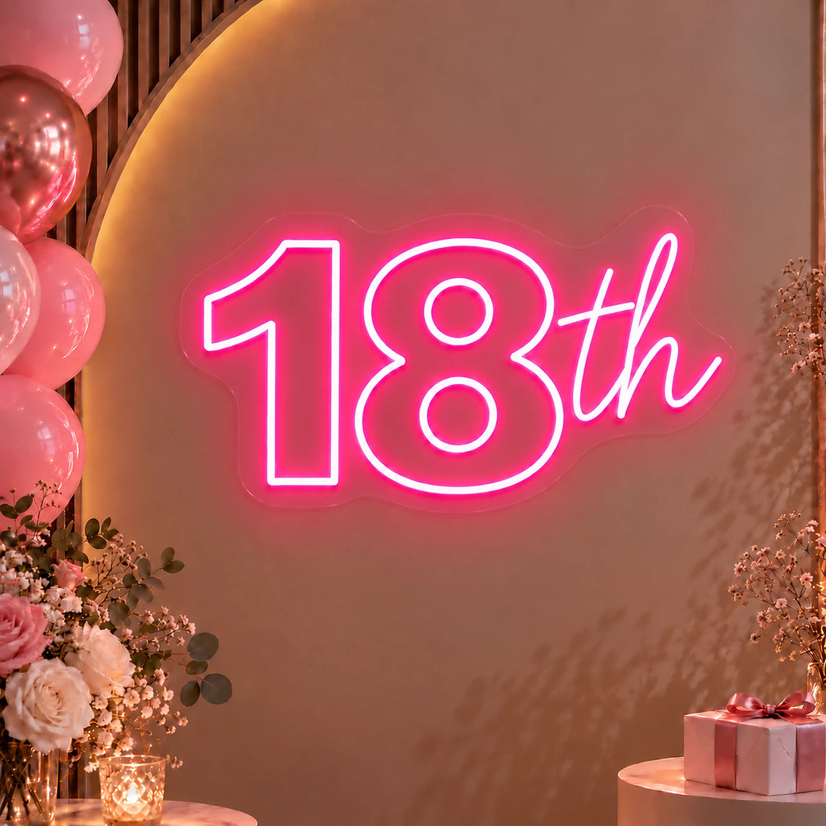 Pink 18th birthday neon sign on a party backdrop