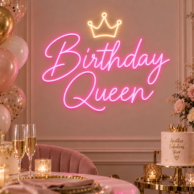 Pink Birthday Queen neon sign with crown on a party backdrop