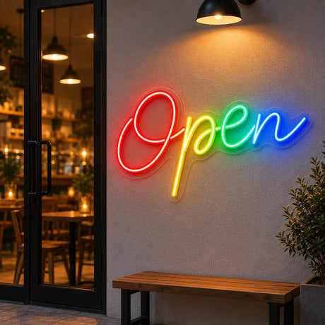 Rainbow open script LED neon sign on a salon feature wall