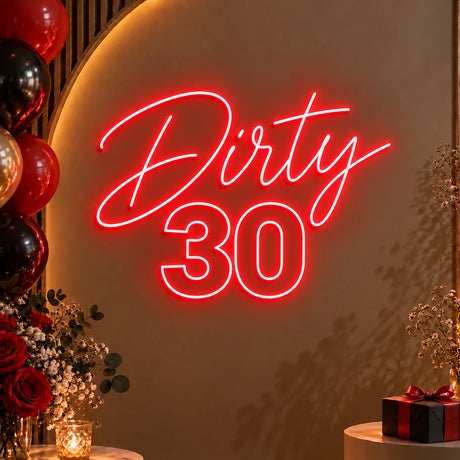 Red Dirty 30 neon sign on a birthday party backdrop
