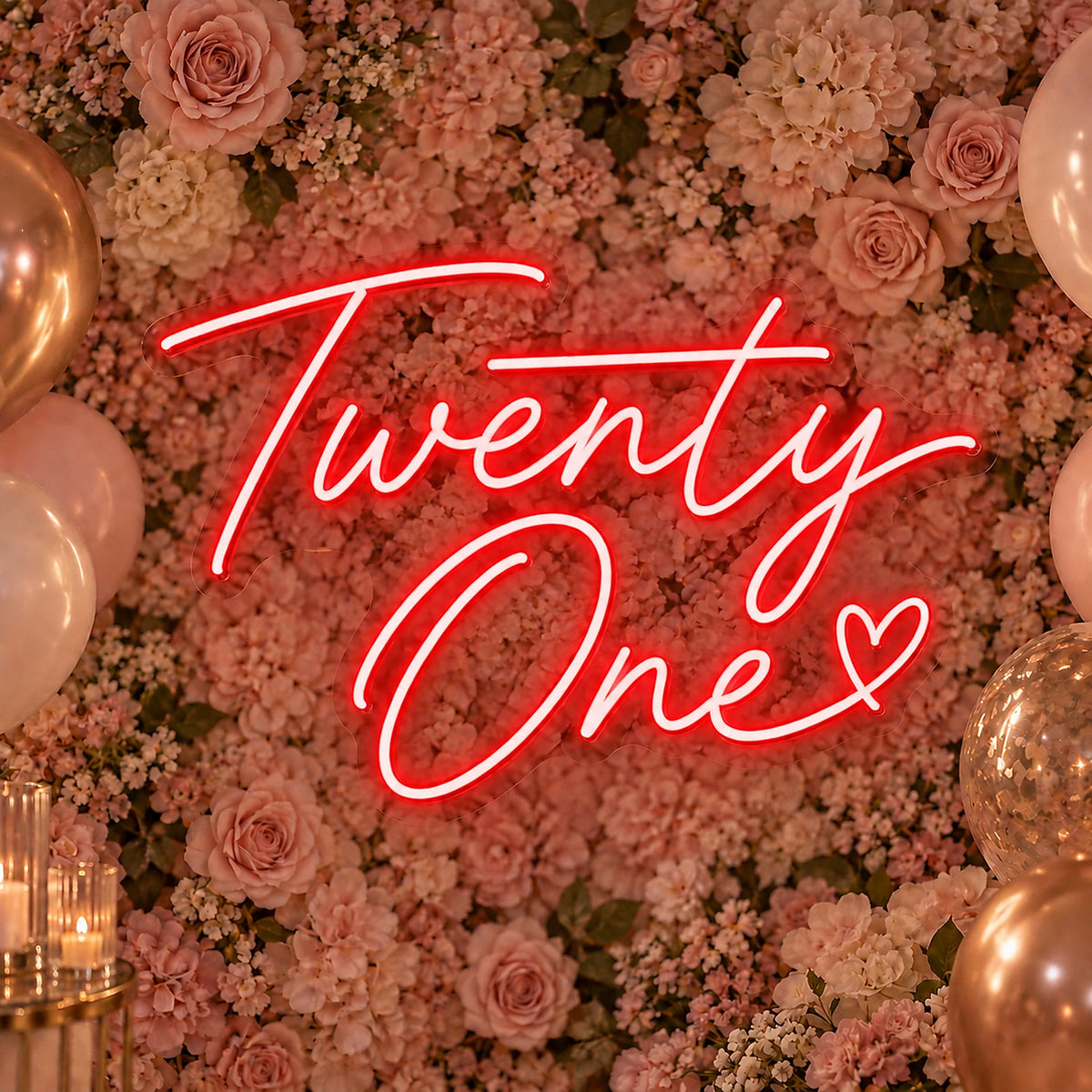 Red Twenty One neon sign on a 21st birthday flower wall