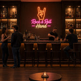 Rock and Roll Hand LED Neon Sign displayed in a live music bar setting