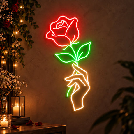 Hand holding rose neon sign as romantic wedding décor