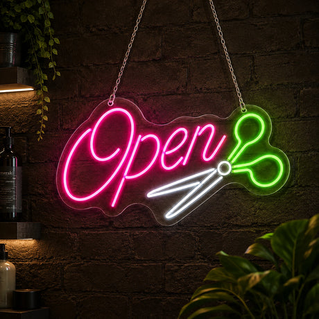 Hair salon open neon sign with scissors motif in a salon window