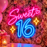 Sweet 16 neon sign on a flower wall at a birthday party