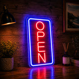 Vertical open neon sign shown lit at night on a retail entrance