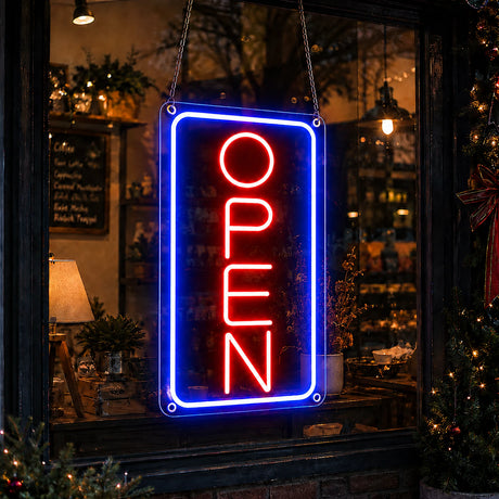 Vertical neon open sign mounted beside a storefront glass door