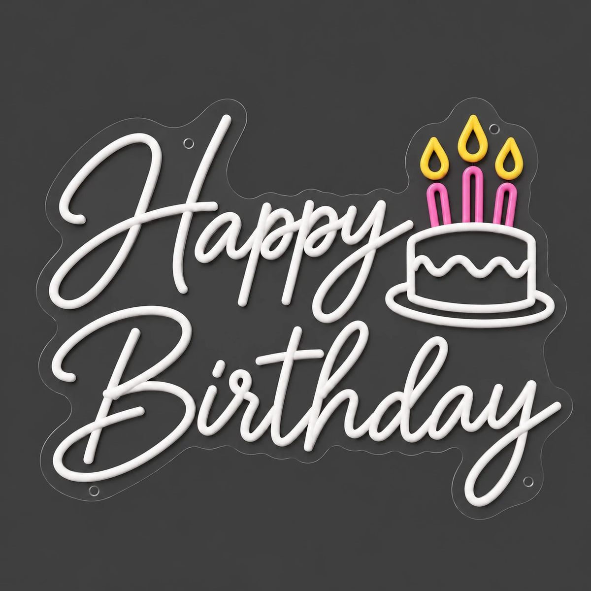 White birthday cake neon sign lit on a dark gray background