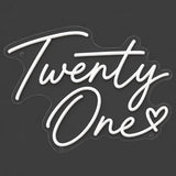 White Twenty One neon sign lit on a dark gray background