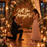 Will You Marry Me proposal neon sign in a floral setup